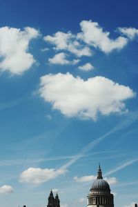 Low angle view of church against cloudy sky