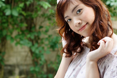 Close-up portrait of woman smiling