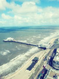 High angle view of sea against cloudy sky