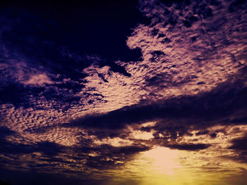 Low angle view of dramatic sky during sunset
