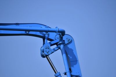 Cropped image of crane against clear sky