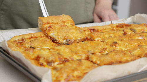 Midsection of person preparing food