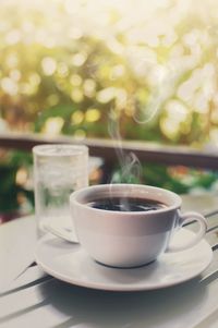 Close-up of coffee cup on table