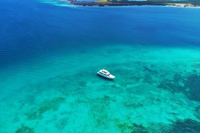 High angle view of sailboat in sea