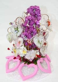 Close-up of flowers over white background