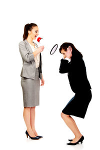Woman standing against white background