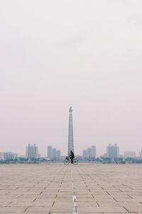 View of buildings against cloudy sky