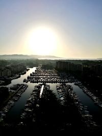 Scenic view of canal against sky during sunset