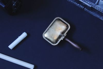 High angle view of cigarette on table