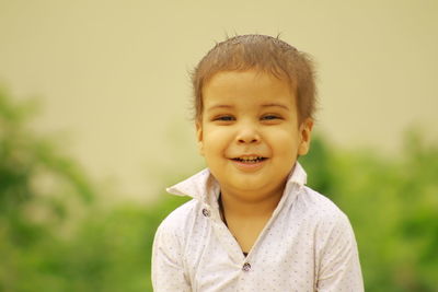 Portrait of cute boy smiling