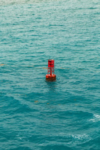 Red boat in sea