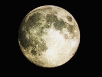 Close-up of moon over black background