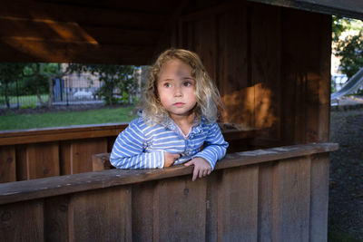 Portrait of cute girl looking away