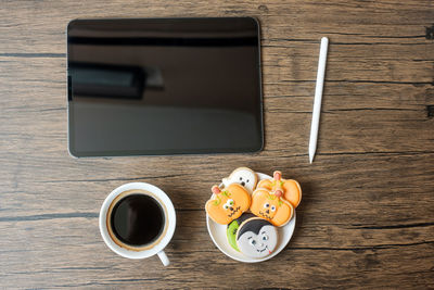 High angle view of coffee cup on table