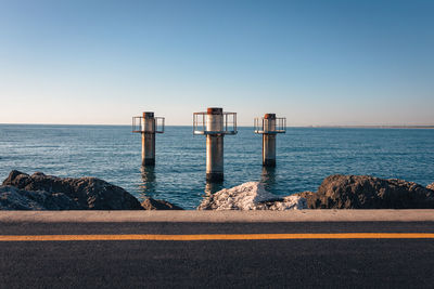 Marina di ravenna, ravenna / italy - august 2020. pillars in the sea