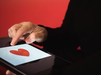 Close-up of man holding hands