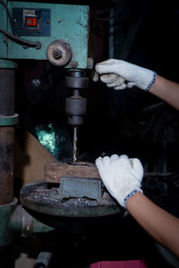 Cropped hand of man preparing food