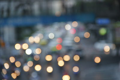 Defocused image of illuminated lights at night