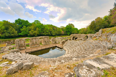 View of old ruins against cloudy sky