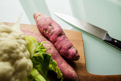 High angle view of vegetables on cutting board