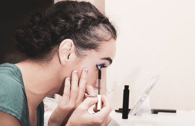 Portrait of young woman smoking