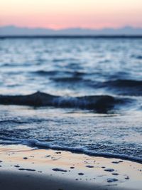 Scenic view of sea at sunset