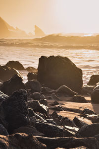 Scenic view of sea against sky during sunset