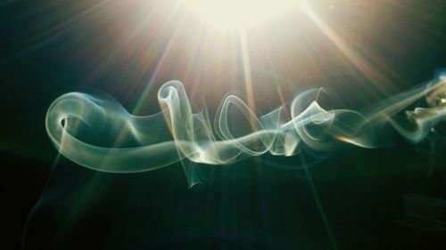 Close-up of smoke during sunny day