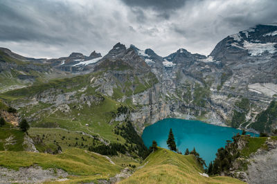 Panoramic view of lake and mountains against sky