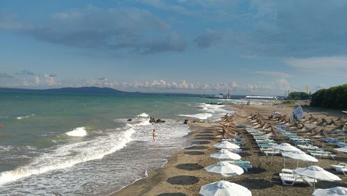 Scenic view of beach against sky