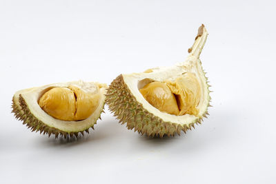 Close-up of fruit against white background