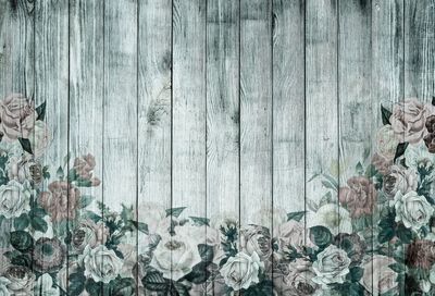 Close-up of flowers on wood