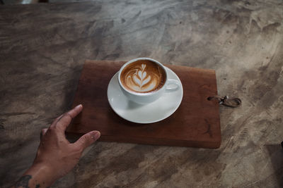 Coffee cup on table