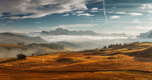 Scenic view of landscape against sky during sunset