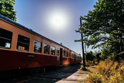 Train on railroad track against sky