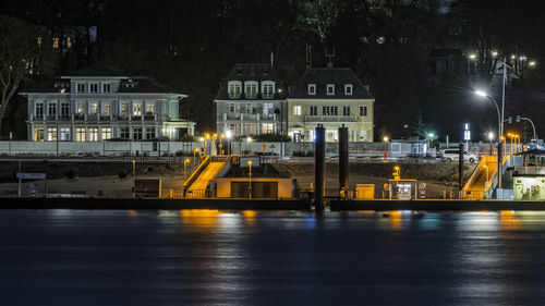 Buildings in city at night