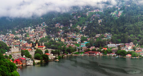 High angle view of townscape by river