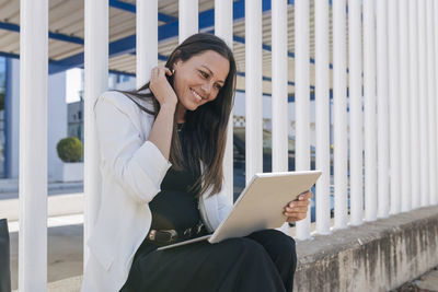 Young woman using mobile phone