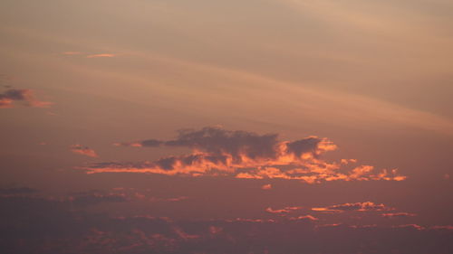 Low angle view of clouds in sky during sunset