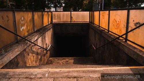 Staircase leading towards building in city