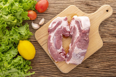 High angle view of vegetables on cutting board