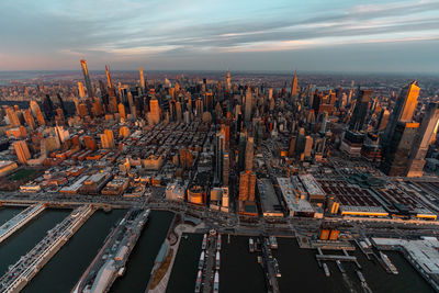 High angle view of cityscape against sky during sunset