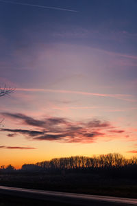 Scenic view of silhouette landscape against sky during sunset