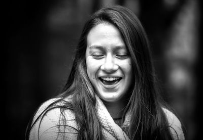 Close-up of smiling girl outdoors