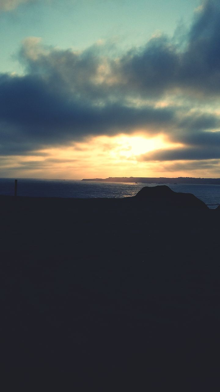 sunset, sky, sea, scenics, tranquil scene, tranquility, beauty in nature, horizon over water, water, cloud - sky, beach, silhouette, orange color, idyllic, nature, shore, cloud, cloudy, dusk, dramatic sky