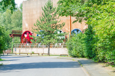 Street by building in city