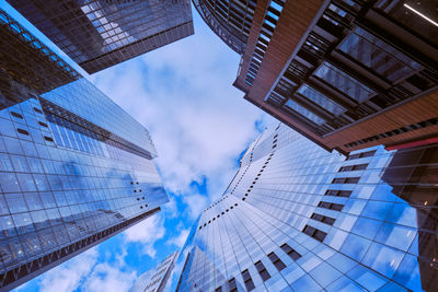 Low angle view of modern buildings against sky