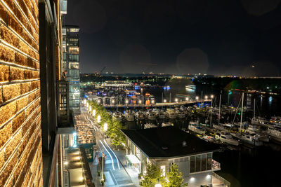 High angle view of city buildings at night