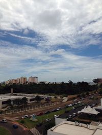 High angle view of buildings in city against sky