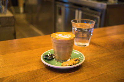 Close-up of coffee served on table